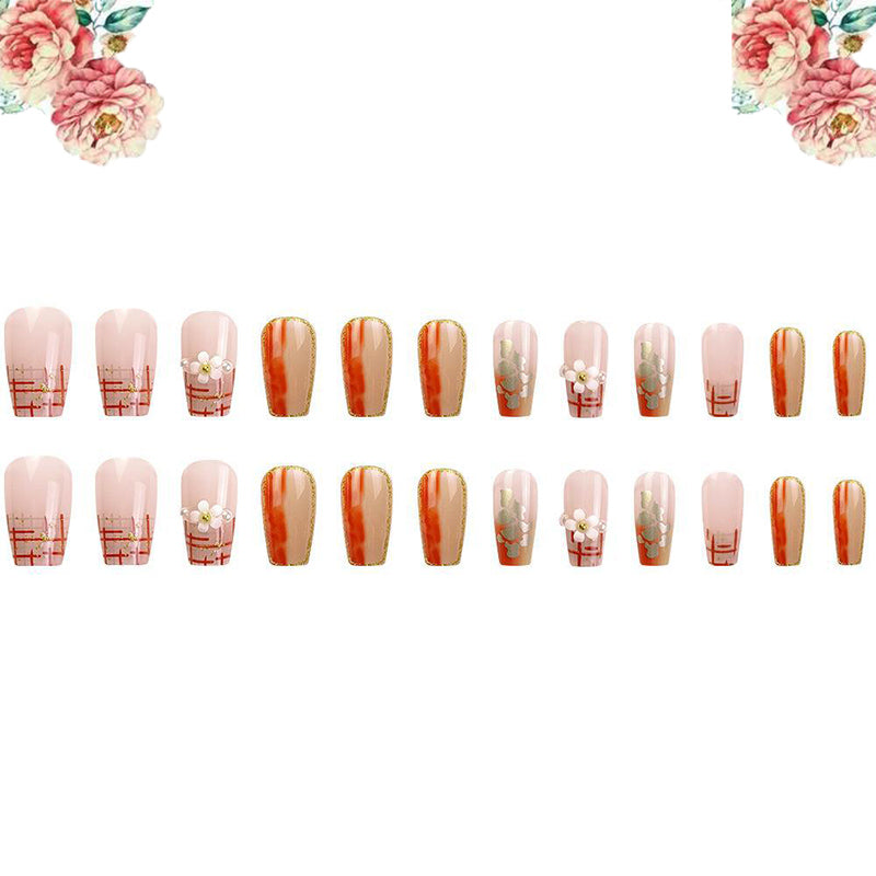 faux ongles fleur orange clair et transparent